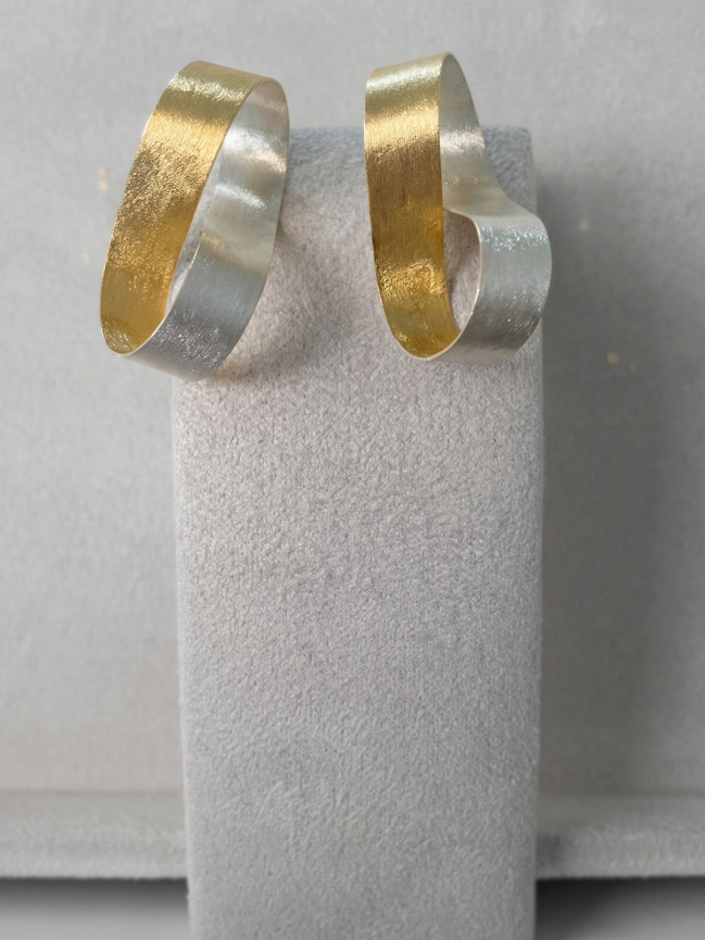 The Sculpted Infinity Ribbon Studs